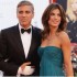 Elisabetta Canalis in Chanel, George Clooney in smocking nero sul red carpet del Festival di Venezia 2009