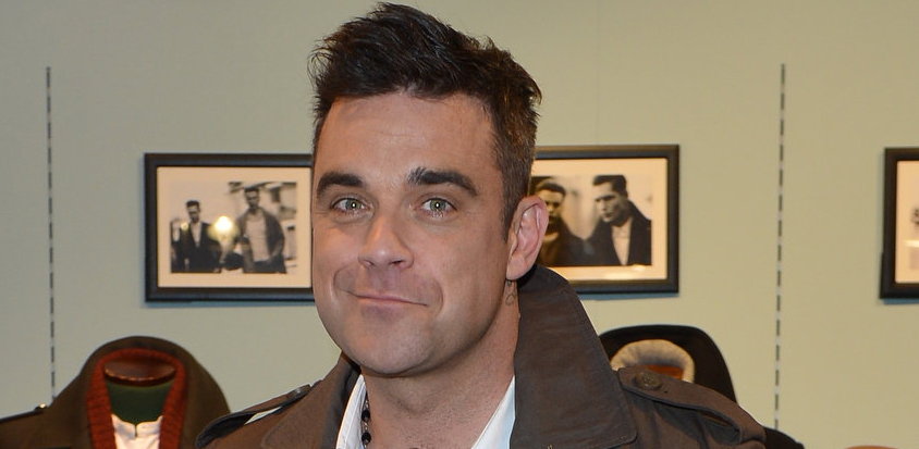Robbie Williams presenta a Milano la sua linea di moda Farrell